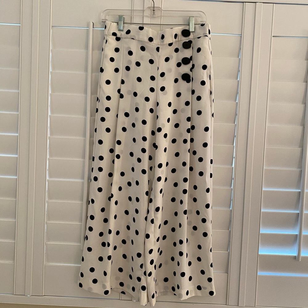Black polka dot culottes.